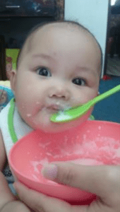 nestle-cerelac-baby-eating